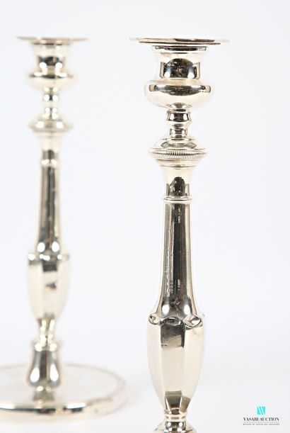 null Pair of silver-plated torches standing on a round base hemmed with gadroons,...