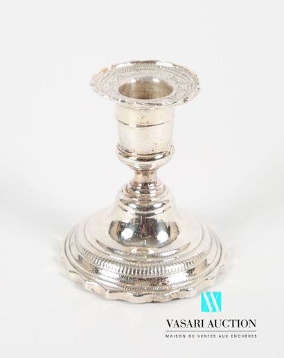 null Toilet candlestick in silver-plated bronze, standing on a round base hemmed...
