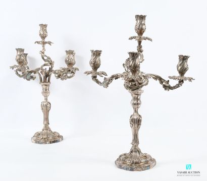 null Pair of five-light candelabra in silver-plated bronze, standing on a moving...