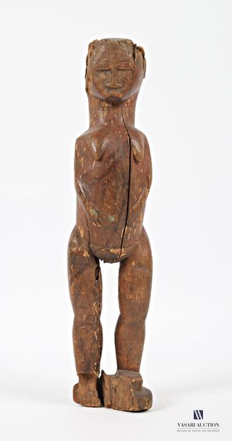 null AFRIQUE 
Statue cultuelle en bois sculpté et patiné figurant une femme les mains...