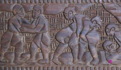 null Natural wood panel decorated with a wrestling scene featuring multiple combatants...