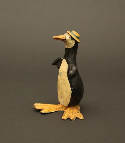 null Boite à bonbons en papier mâché figurant

un pingouin.

Haut. : 21 cm