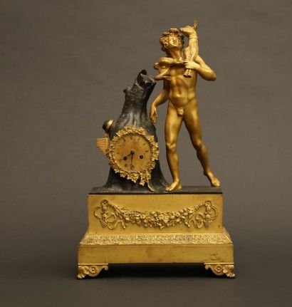 null Pendule «Le Bon Pasteur» en bronze doré

et patiné, elle présente un cadran...