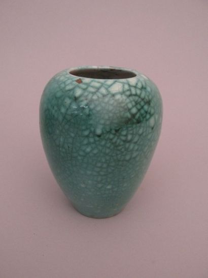 null C.A.B. (Céramique d’Art de Bordeaux)

Vase de forme ovoïde en terre cuite vernissée

légèrement...
