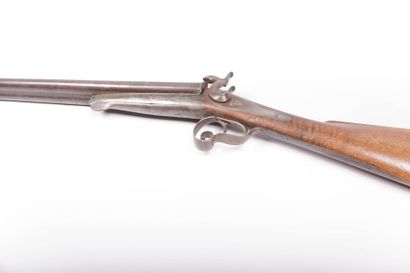 null Fusil de chasse à broche - Cal. 20

juxtaposé platines en arrière - crosse anglaise...