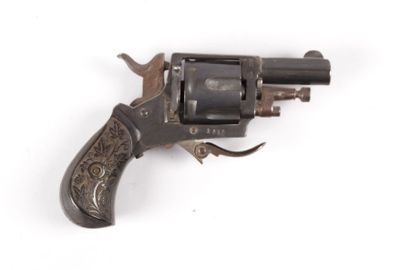 null Revolver de poche - Cal. 31 - crosse bec

de corbin ornée de feuillages - choc...
