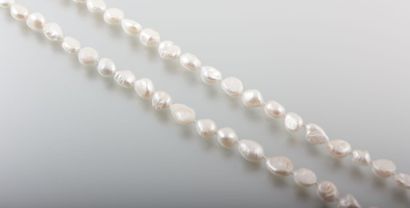 null Long sautoir de perles d'eau douces blanches irrégulières

Long. : 90 cm