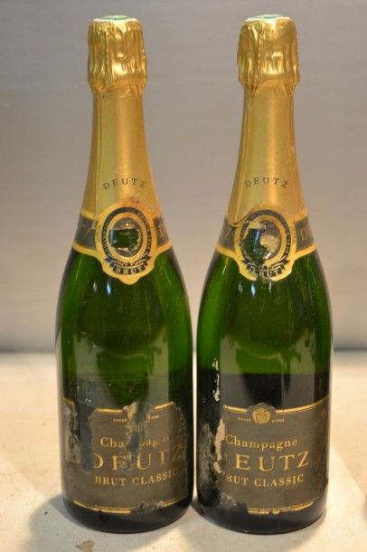 null 2 Blles	Champagne DEUTZ Brut Classic		NM	30/35

	Et. déchirées mais lisibles....