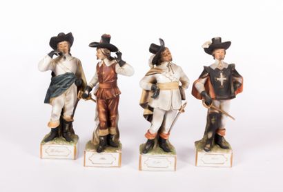 null Quatre sujets en porcelaine peinte représentant les quatre mousquetaires d'Artagnan,...