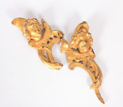 null Deux têtes d'angelots en bois sculpté et

doré - XVIIIème siècle

(éléments...