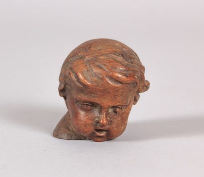 null Sujet en bois sculpté figurant une tête d'enfant joufflu

XVIIIème siècle

Haut....