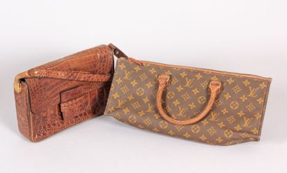null Deux sacs à main, l'un Louis Vuitton

(usures, vendu en l'état)
