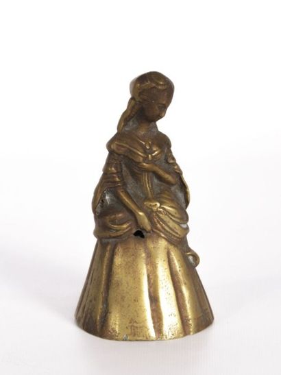 null Clochette de table en bronze figurant une élégante

(manque le timbre, un trou)

Début...