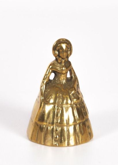 null Clochette de table en bronze figurant une élégante à la robe

Haut. : 9 cm