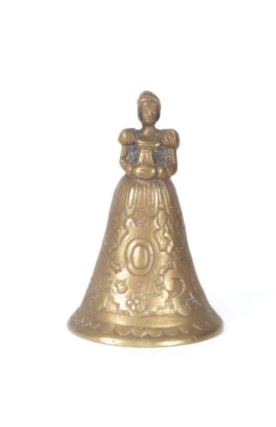 null Clochette de table en bronze figurant une élégante

Haut. : 8,5 cm