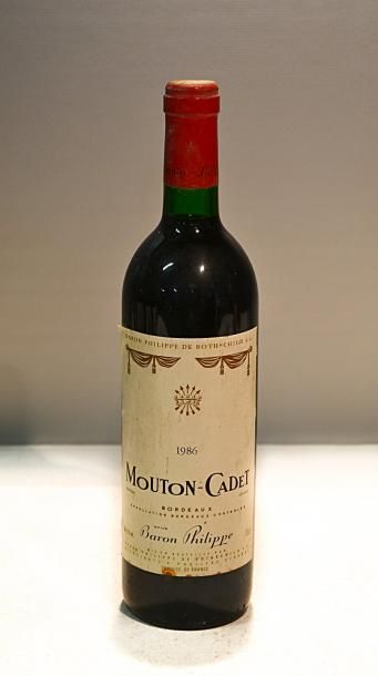 null 1 Blle	MOUTON CADET	Bordeaux mise nég.	1986

	Et. un peu tachée. N : bas go...