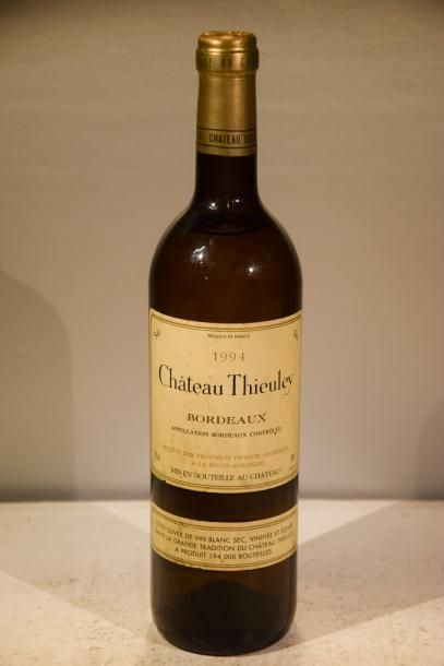 null 1 Blle	CH. THIEULEY	Bordeaux Blanc	1994

	Et. un peu tachée. N : ht/mi épaule...