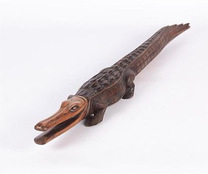 null MALI
Sculpture en bois figurant un crocodile
XXème siècle
(léger manque à la...