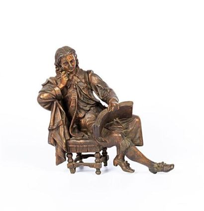 null Sujet en régule figurant un jeune poète assis sur une chaise cherchant l'inspiration...