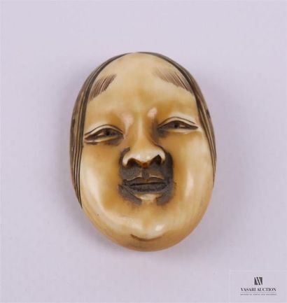 JAPON Netsuké en ivoire figurant un masque...