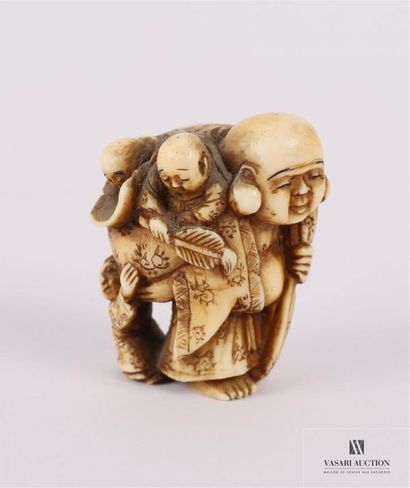 JAPON Netsuké en ivoire figurant un bouddha...