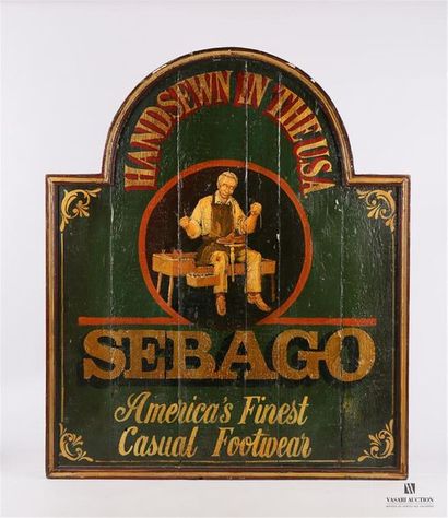 null SEBAGO - Panneau publicitaire à fronton cintrée en bois naturel mouluré et peint,...