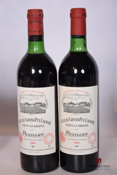 null 2 Blles	CH. GRAND PUY LACOSTE	Pauillac GCC	1982
	Et. à peine tachées. N : 1...