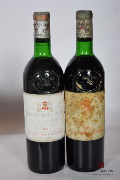 null 2 Blles	CH. PAPE CLÉMENT	Graves GCC	1986
	Et.: 1 un peu tachée, 1 très tachée....