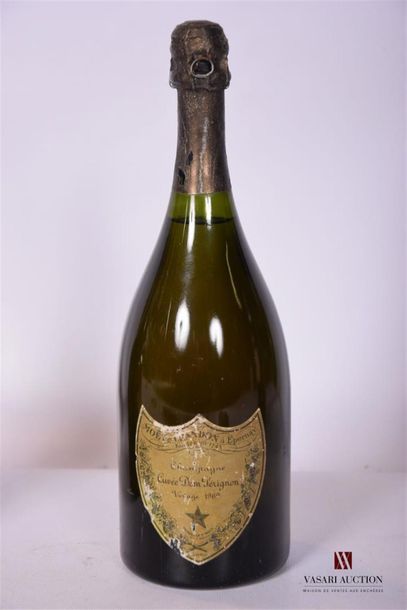 null 1 Blle	Champagne DOM PÉRIGNON 		1969
	Et. usée. Coiffe excellente. N : léger...