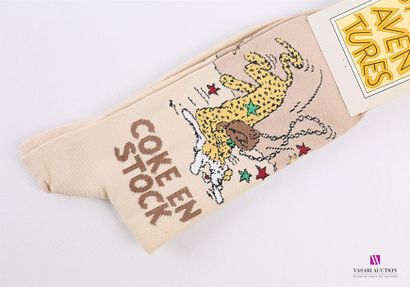 null HERGÉ - Studio aventures 
Paire de chaussettes " Coke en Stock" beige
Taille...