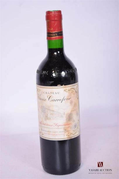 null 1 Blle	CH. VIEUX CARREFOUR	Bordeaux Sup	1995
	Et. un peu tachée. N : mi gou...