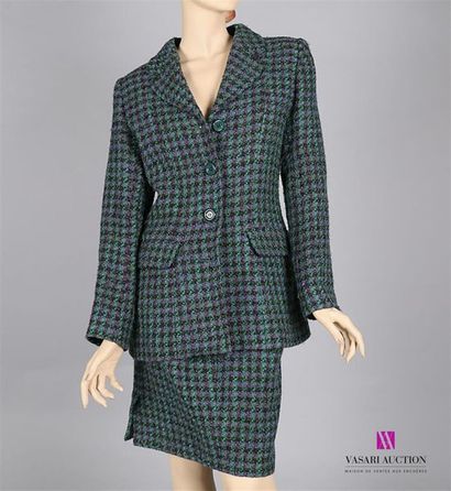 null YVES SAINT LAURENT
Tailleur jupe en laine de couleur violet/vert/noir
Taille...