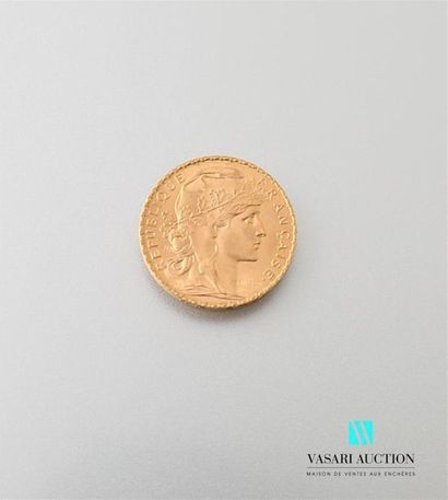 null Une pièce en or de 20 Frcs République Française 1910
Poids : 6,46 g