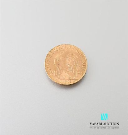 null Une pièce en or de 20 Frcs République Française 1907
Poids : 6,45 g