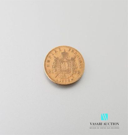 null Une pièce en or de 20 Frcs Napoléon III 1864
Poids : 6,43 g