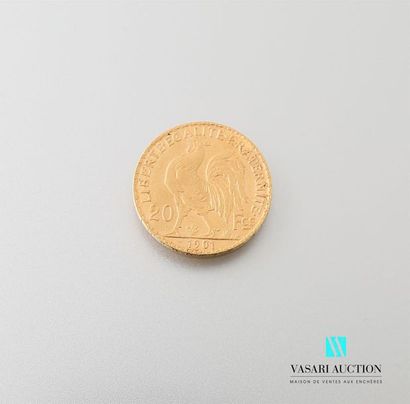 null Une pièce en or de 20 Frcs République Française 1901
Poids : 6,43 g