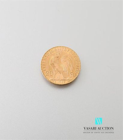 null Une pièce en or de 20 Frcs République Française 1907
Poids : 6,44 g