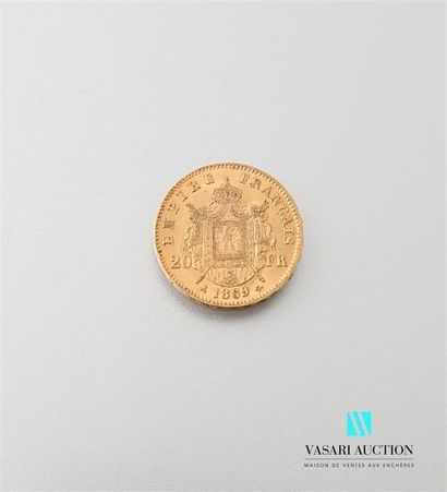 null Une pièce en or de 20 Frcs Napoléon III 1869
Poids : 6,44 g