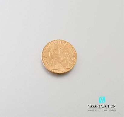 null Une pièce en or de 20 Frcs République Française 1901
Poids : 6,45 g