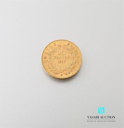 null Une pièce en or de 20 Frcs Napoléon III 1857
Poids : 6,44 g