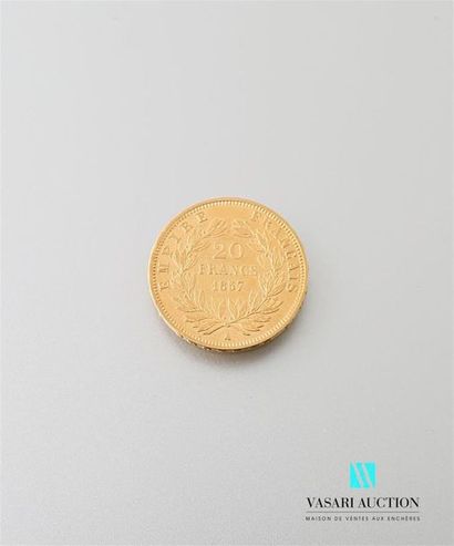 null Une pièce en or de 20 Frcs Napoléon III 1857
Poids : 6,41 g