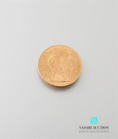null Une pièce en or de 20 Frcs République Française 1912
Poids : 6,44 g