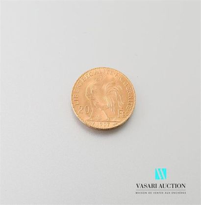null Une pièce en or de 20 Frcs République Française 1907
Poids : 6,46 g