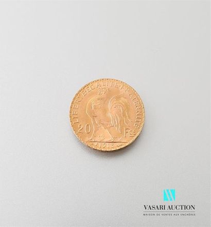 null Une pièce en or de 20 Frcs République Française 1913
Poids : 6,46 g