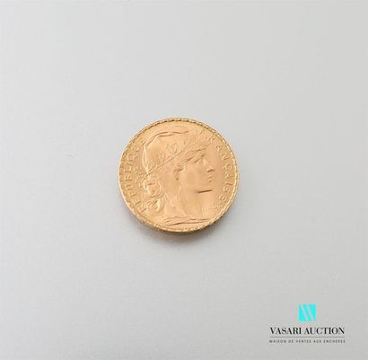 null Une pièce en or de 20 Frcs République Française 1911
Poids : 6,46 g