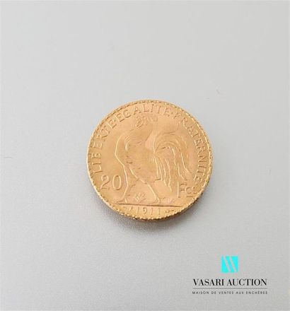 null Une pièce en or de 20 Frcs République Française 1911
Poids : 6,46 g