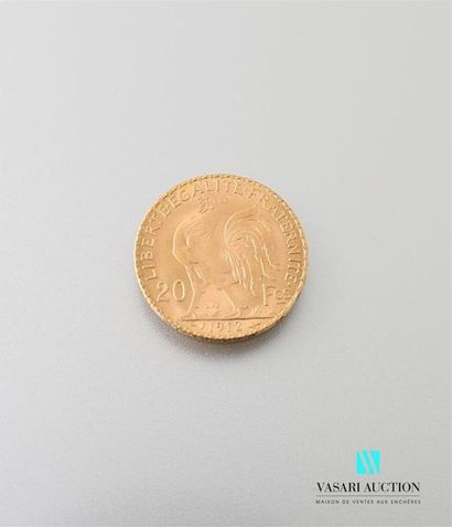 null Une pièce en or de 20 Frcs République Française 1912
Poids : 6,46 g