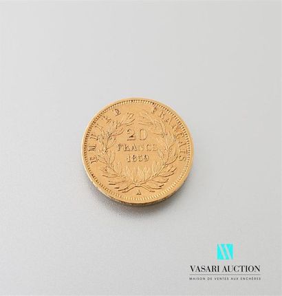 null Une pièce en or de 20 Frcs Napoléon III 1859
Poids : 6,45 g