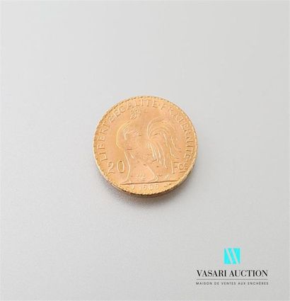 null Une pièce en or de 20 Frcs République Française 1909
Poids : 6,46 g