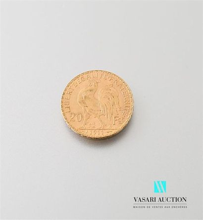 null Une pièce en or de 20 Frcs République Française 1911
Poids : 6,45 g